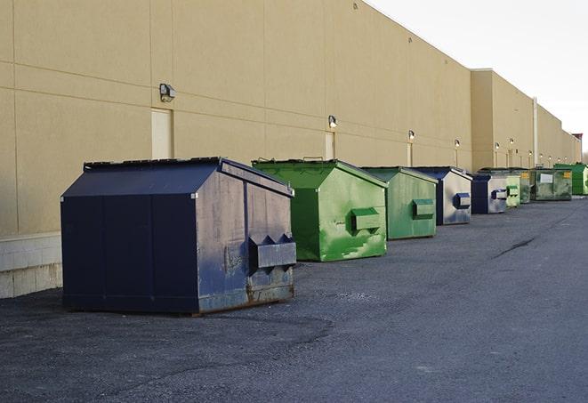 a stack of heavy construction dumpsters waiting to be emptied in Burneyville